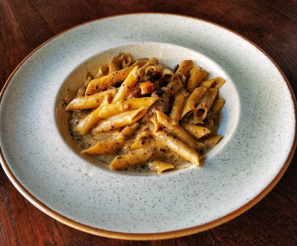 Creamy penne pasta with truffle sauce and pancetta at Konoba Malo Misto, Zadar