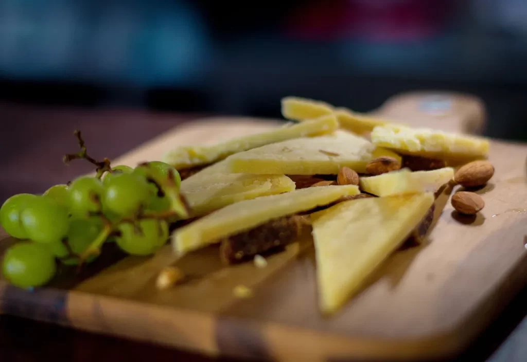 Traditional Croatian cheese platter with almonds and green grapes at Konoba Malo Misto, Zadar