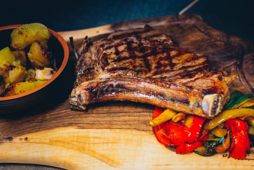 Grilled rib-eye steak with roasted vegetables and potatoes at Konoba Malo Misto, Zadar