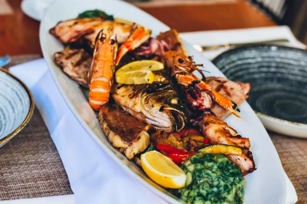 Charcoal-grilled Adriatic seafood platter with fish, prawns & squid at Konoba Malo Misto, Croatian restaurant in Zadar