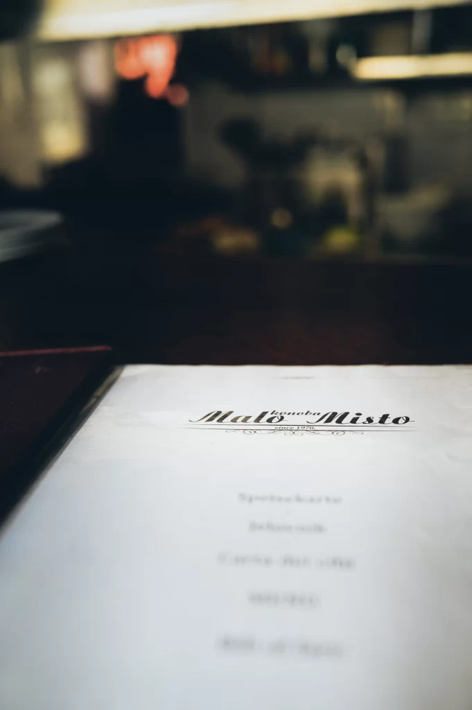 Close-up of Konoba Malo Misto restaurant menu in Zadar, Croatia