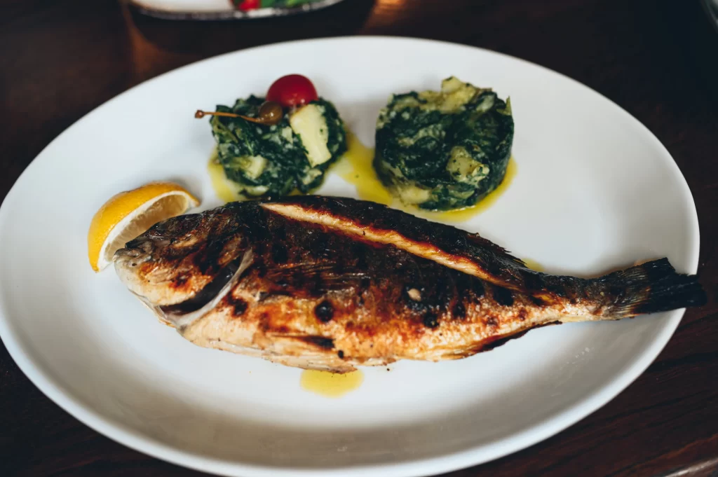 Grilled Adriatic fish with blitva and potatoes at Konoba Malo Misto in Zadar, Croatia
